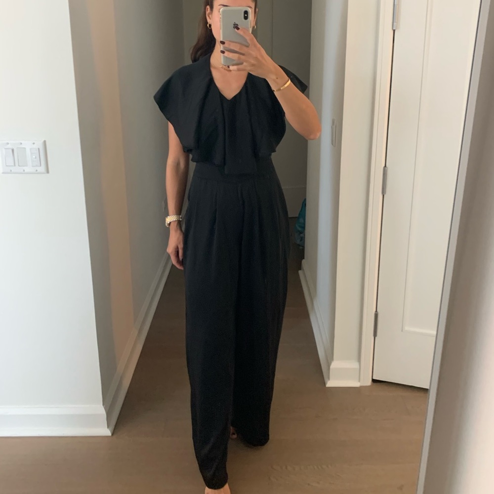 Ark & Co black ruffle jumpsuit, low back.